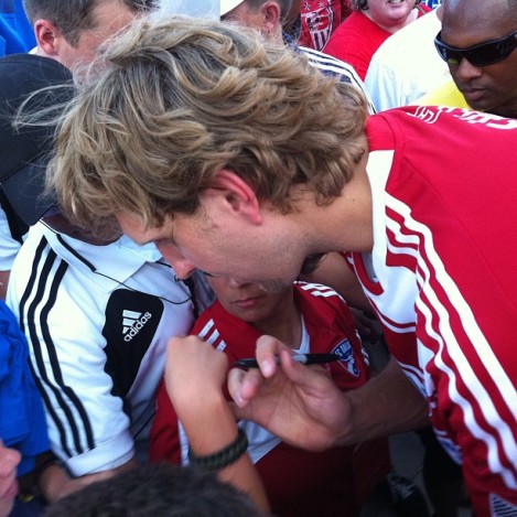 Pic I took getting Dirk's autograph at an FC Dallas match.  See, I told you we're tight.